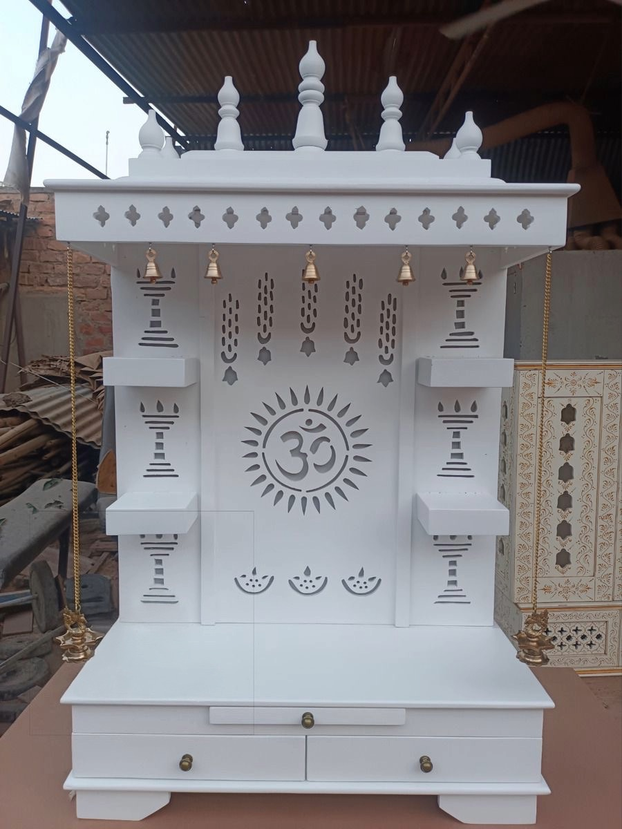 Elegant white handcrafted wooden pooja mandir with temple-style domes and storage