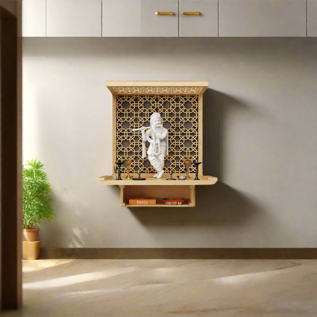 Modern wooden wall-mounted pooja mandir with white Krishna idol and intricate jaali back panel, ideal for contemporary Indian home interiors.