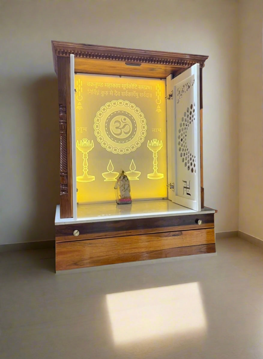 Wooden pooja mandir with built-in storage drawers, crafted from premium teakwood and white Corian for both beauty and functionality.
