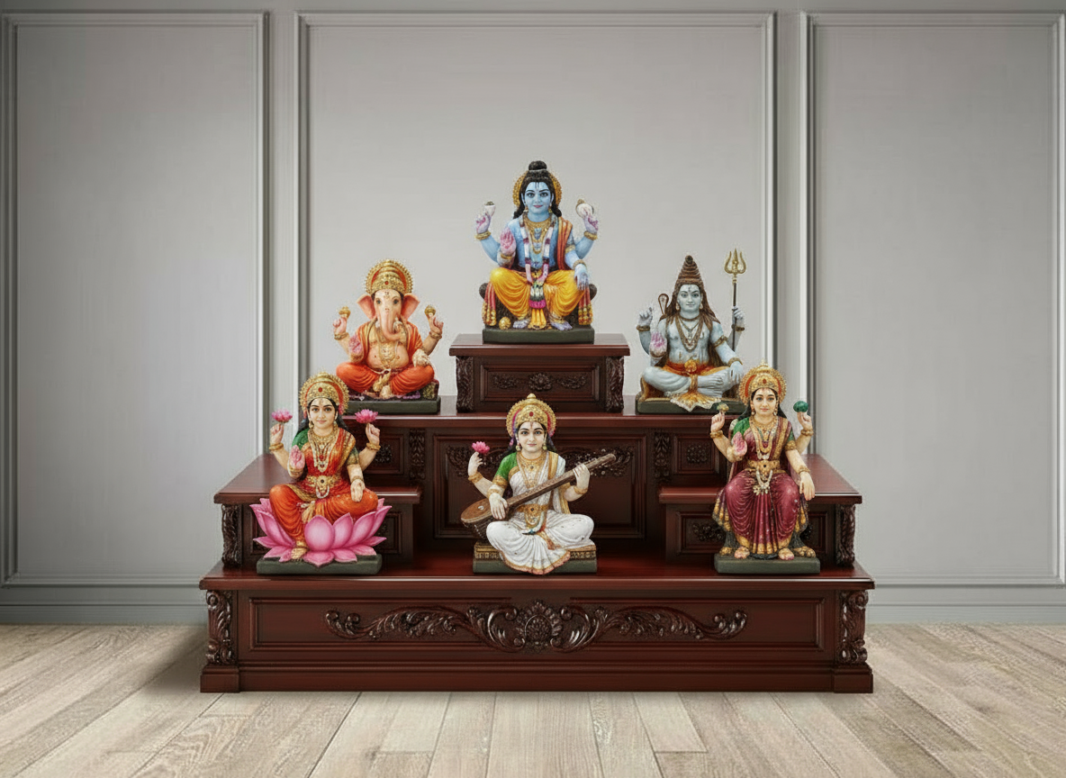 Beautiful teakwood mandir chowki decorated with Hindu deity idols for pooja room setup.