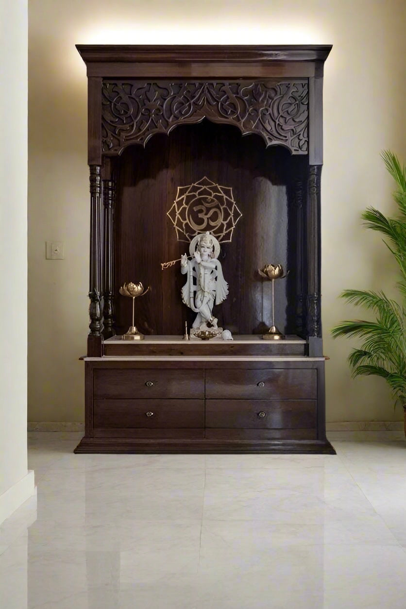 Handcrafted Sheesham wood wall-mounted mandir in rich brown tone with carved jaali back panel, perfect for modern apartment worship spaces.