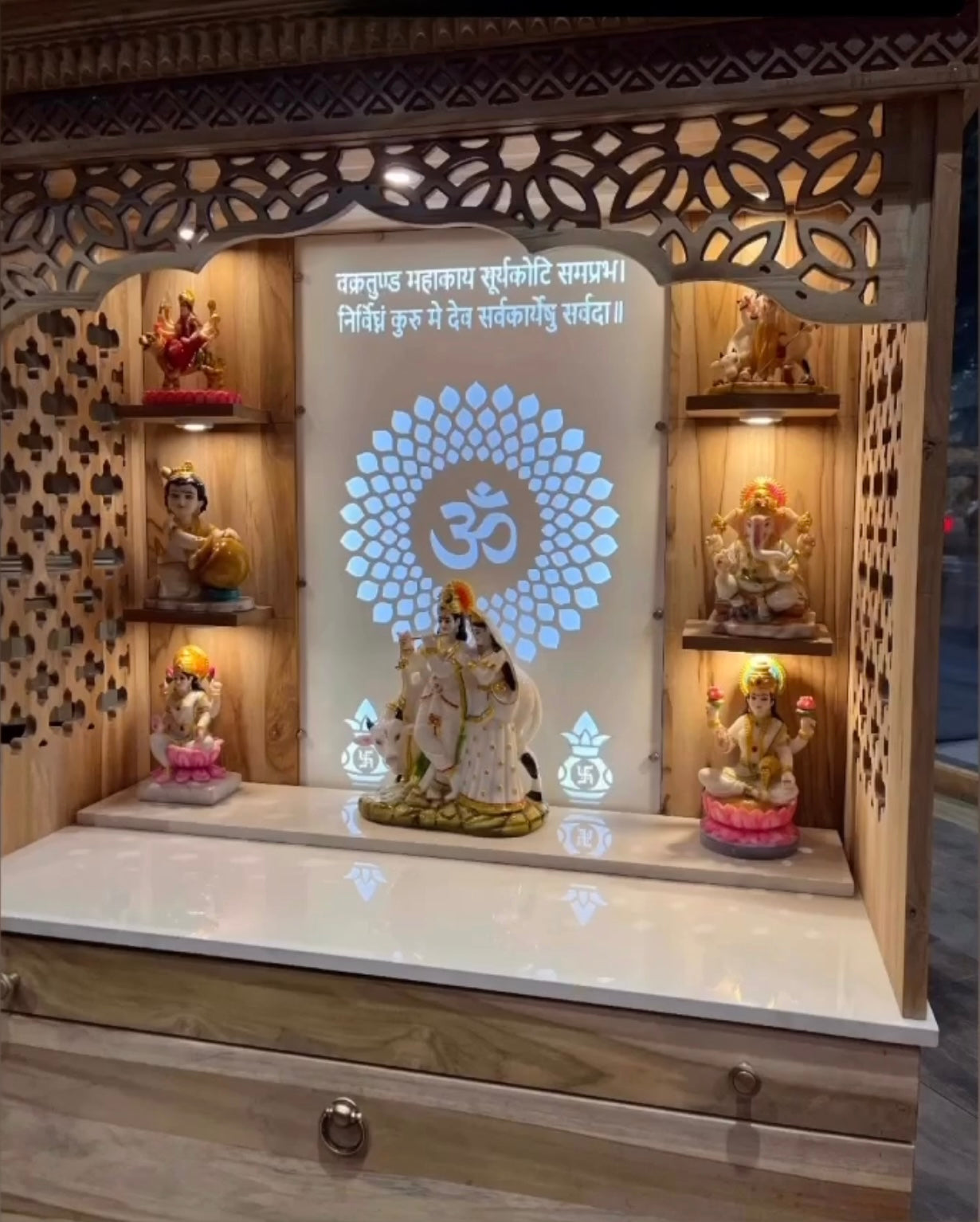 Elegant wooden home temple with acrylic OM LED backlit panel and intricate carved detailing