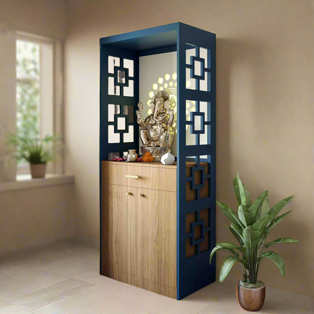 Premium modular Pooja Mandir with modern blue geometric side panels, wooden base cabinet, and Lord Ganesha idol placed inside, set against a beige wall with a potted plant beside it.