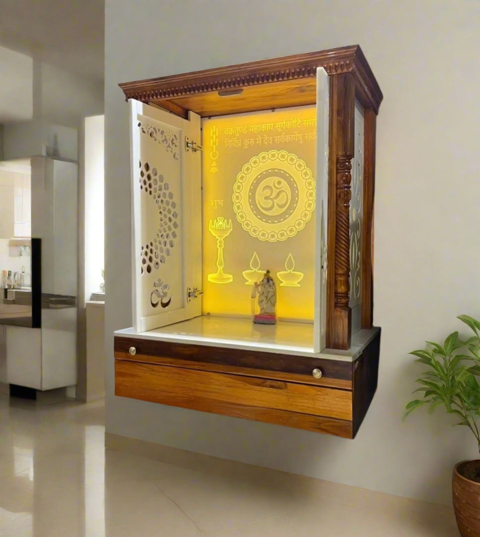 Teakwood and Corian pooja mandir with LED backlit Om and Ganesh mantra engraving, perfect for adding spiritual elegance to your home.