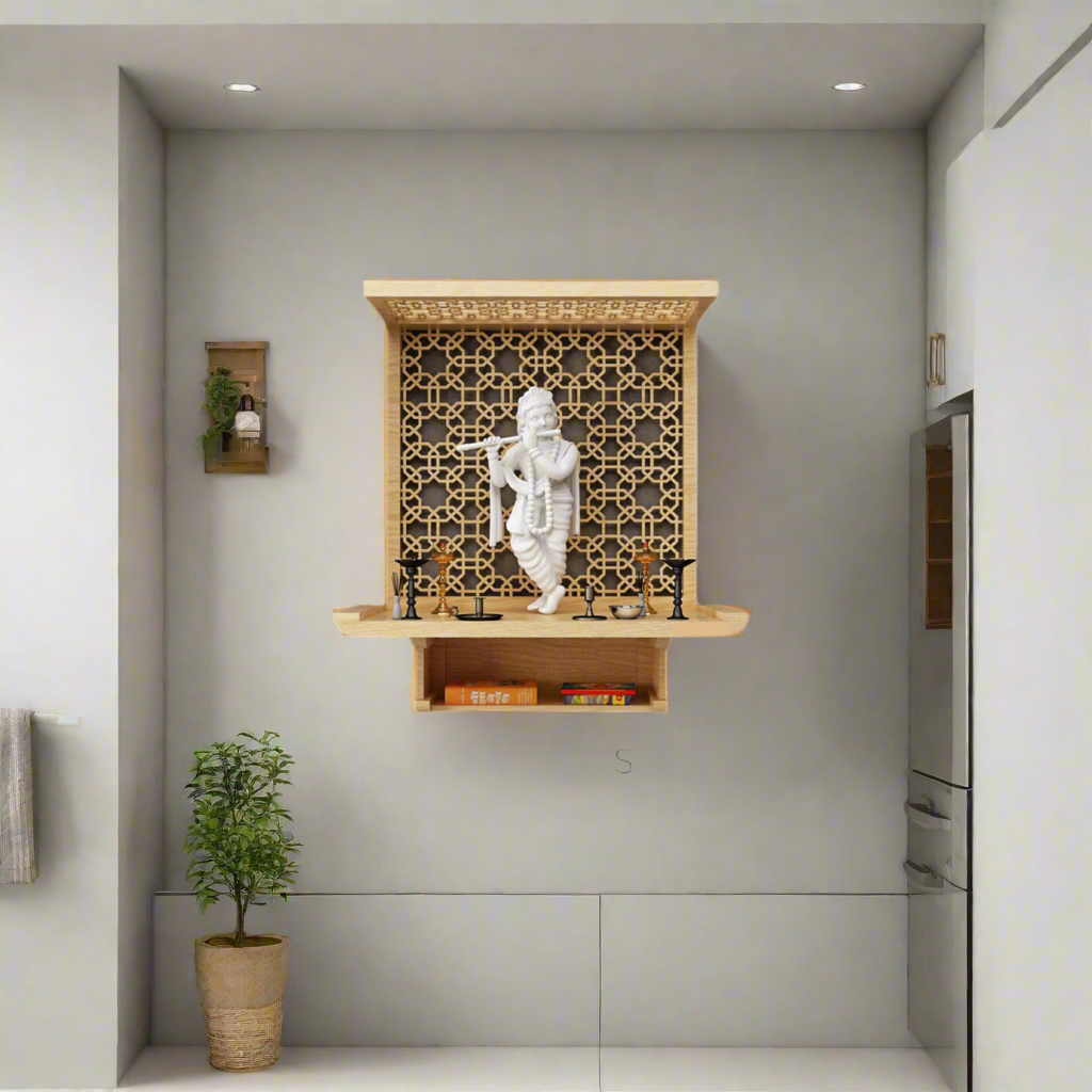 Premium wooden wall-mounted Krishna pooja mandir with intricate laser-cut back panel, white marble idol, and built-in storage, styled in a contemporary home setting.