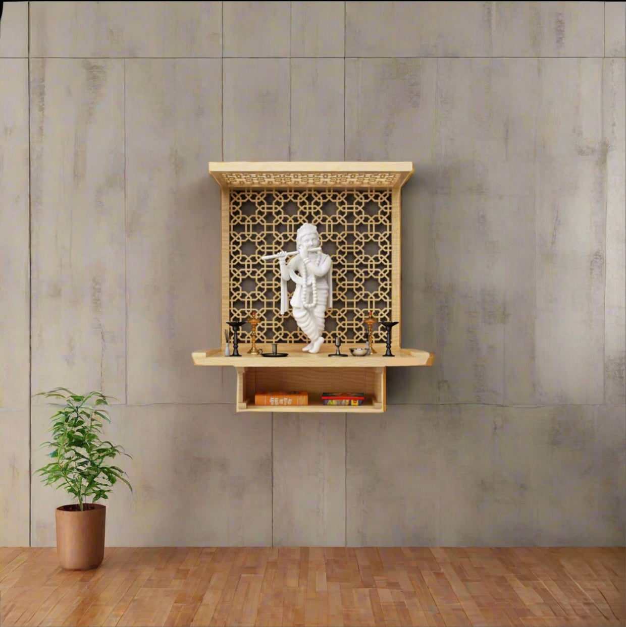 Compact wooden temple for home with carved back panel, Krishna statue, and diya holders, mounted on a beige wall with wooden flooring and a potted plant.