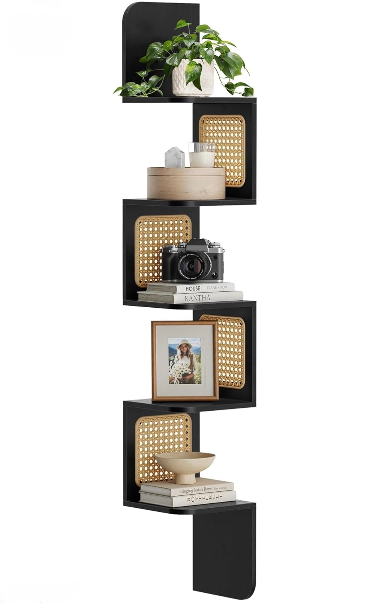 Wall-mounted 5-tier corner shelf with handwoven cane accents, styled in a boho-themed living room.