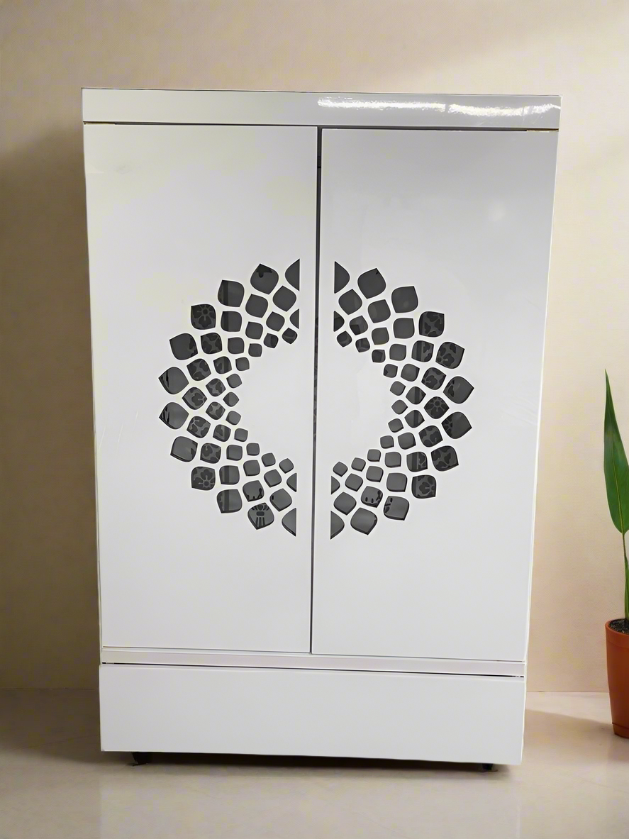 A contemporary home temple with a pristine white finish, featuring a stunning symmetrical laser-cut design on the cabinet doors, providing an elegant and sacred ambiance.
