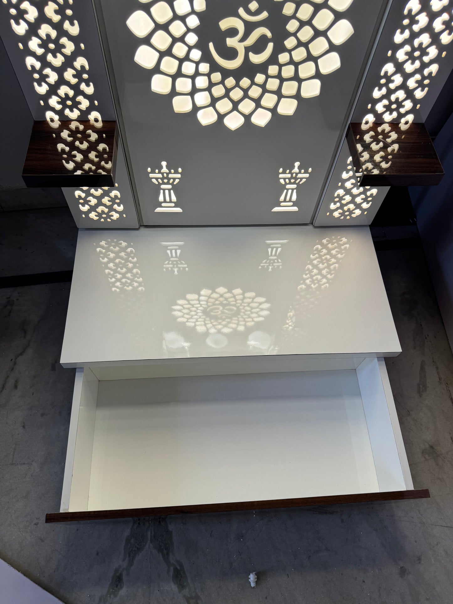Acrylic and wood pooja mandap with glowing Om design and side shelving