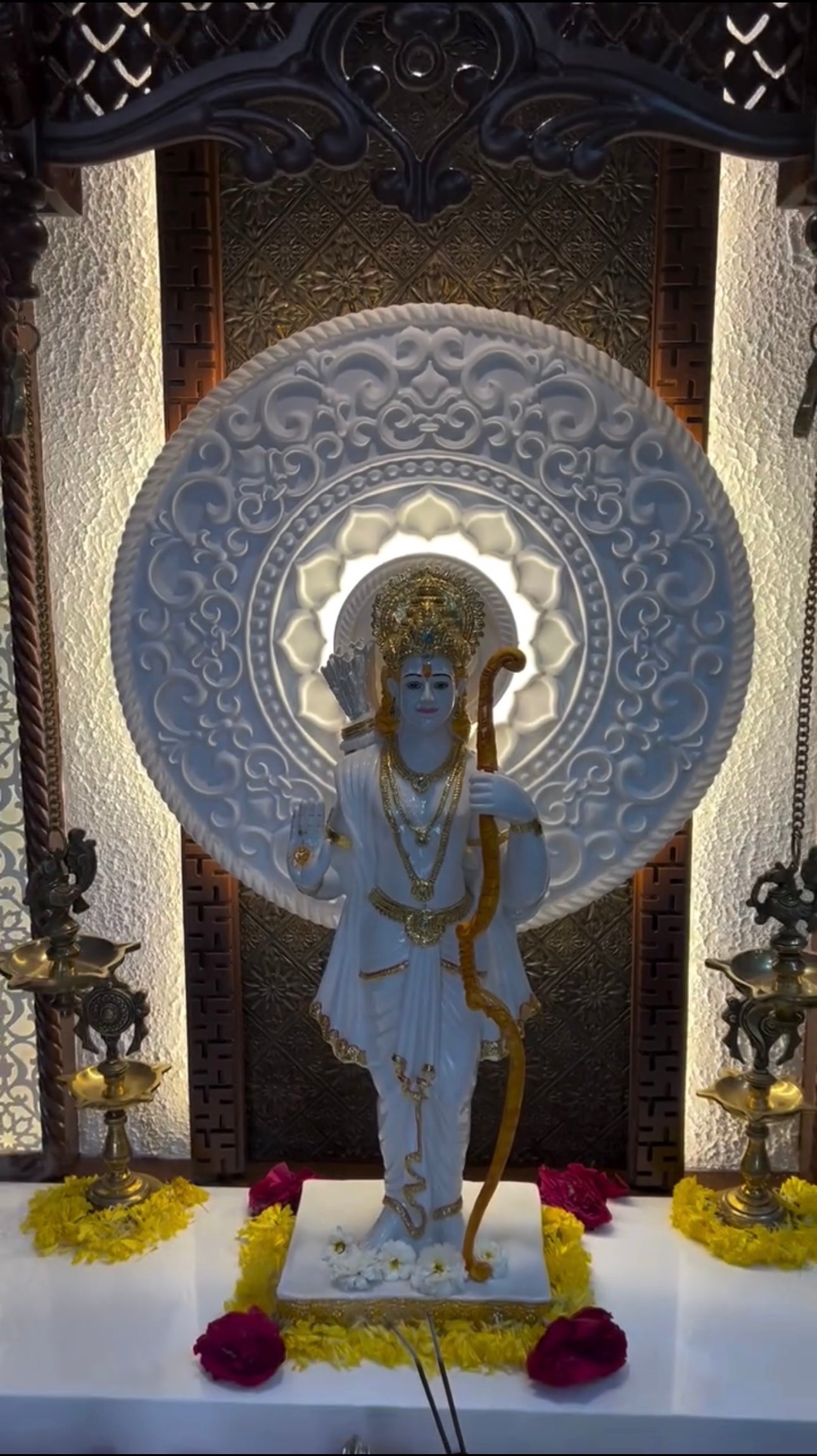 Premium home temple setup with handcrafted wood carvings, backlight panel, and puja accessories.