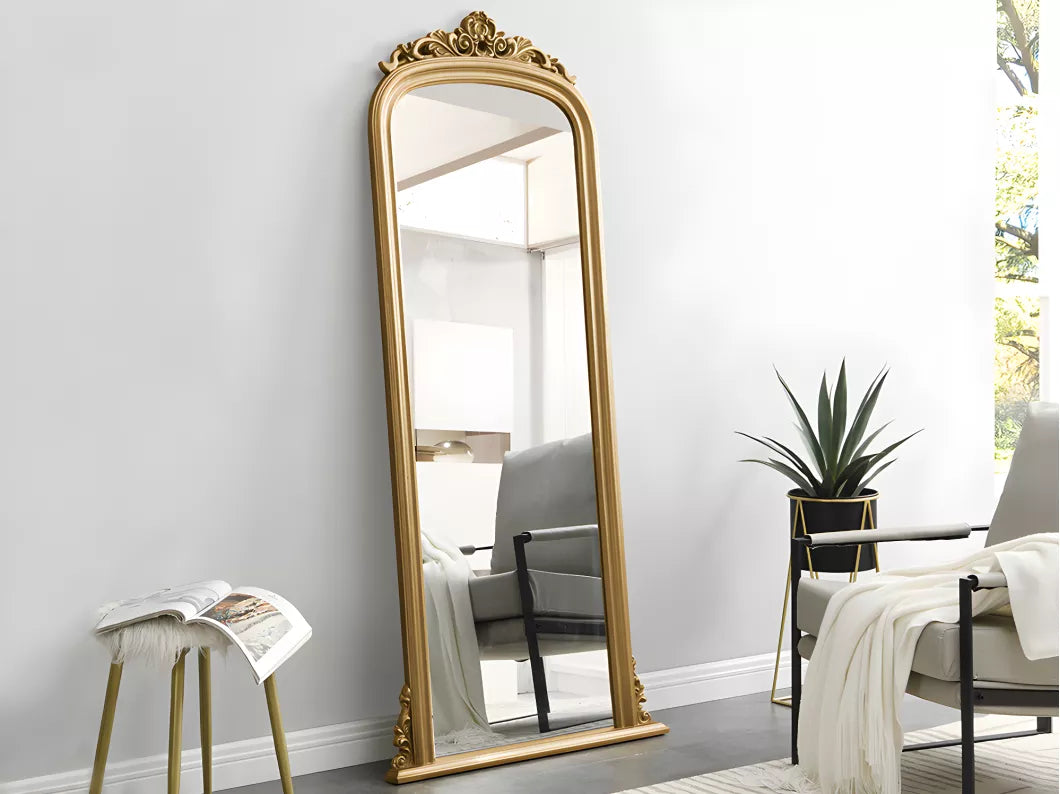 Vintage-inspired gold arch floor mirror with baroque detailing, ideal for classic and modern interiors.
