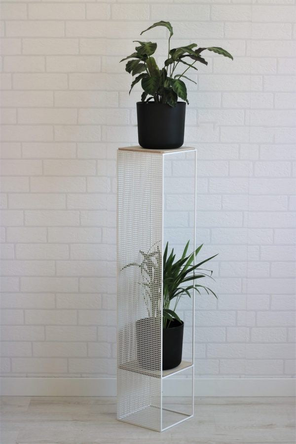 Contemporary tall planter stand with perforated metal frame and wooden shelves, showcasing indoor greenery decor