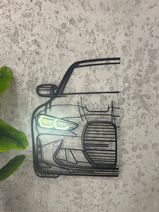 BMW front view LED metal wall art mounted on a textured concrete wall, featuring illuminated headlights and modern industrial design