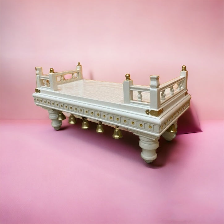 Elegant pooja chowki with a classic white and gold finish, beautifully crafted with intricate details for Hindu rituals, prayer rooms, and festive celebrations.