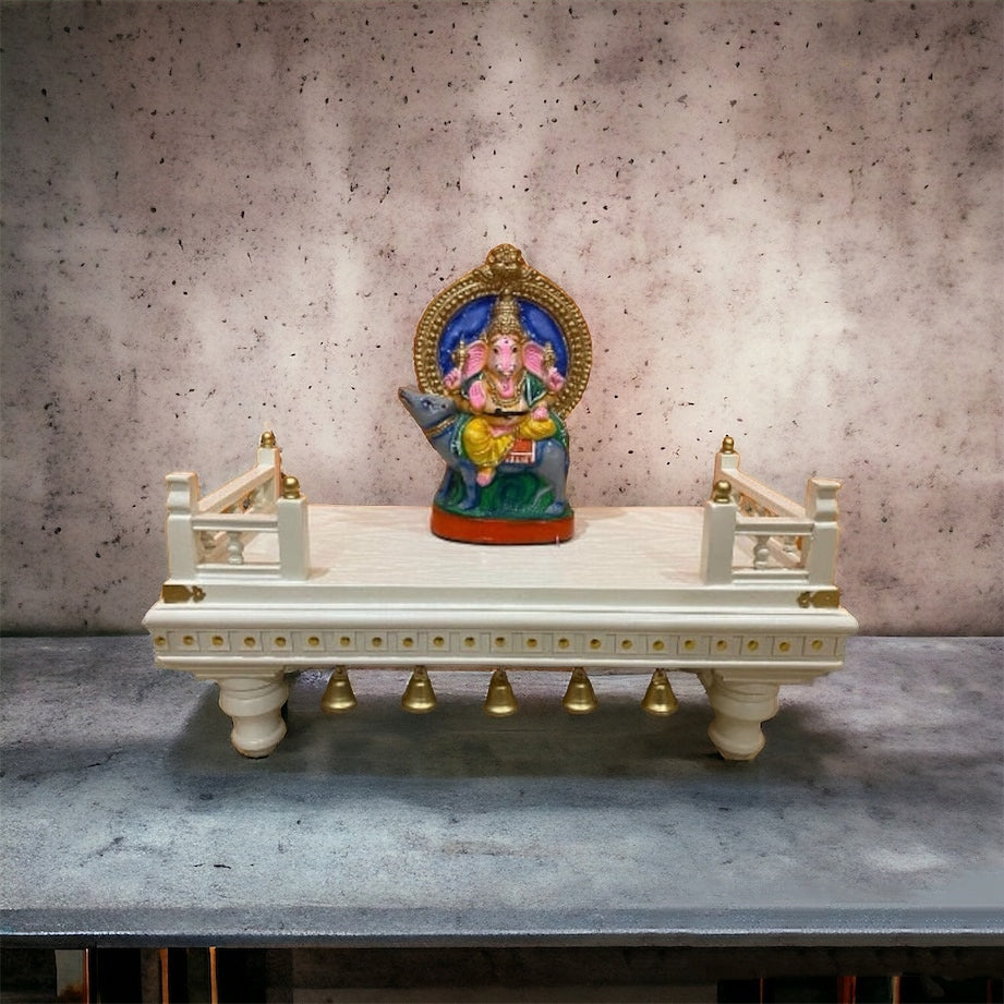 Exquisite wooden chowki for puja with gold embellishments, beautifully designed for idols, deity placement, and festive rituals at home or temples.