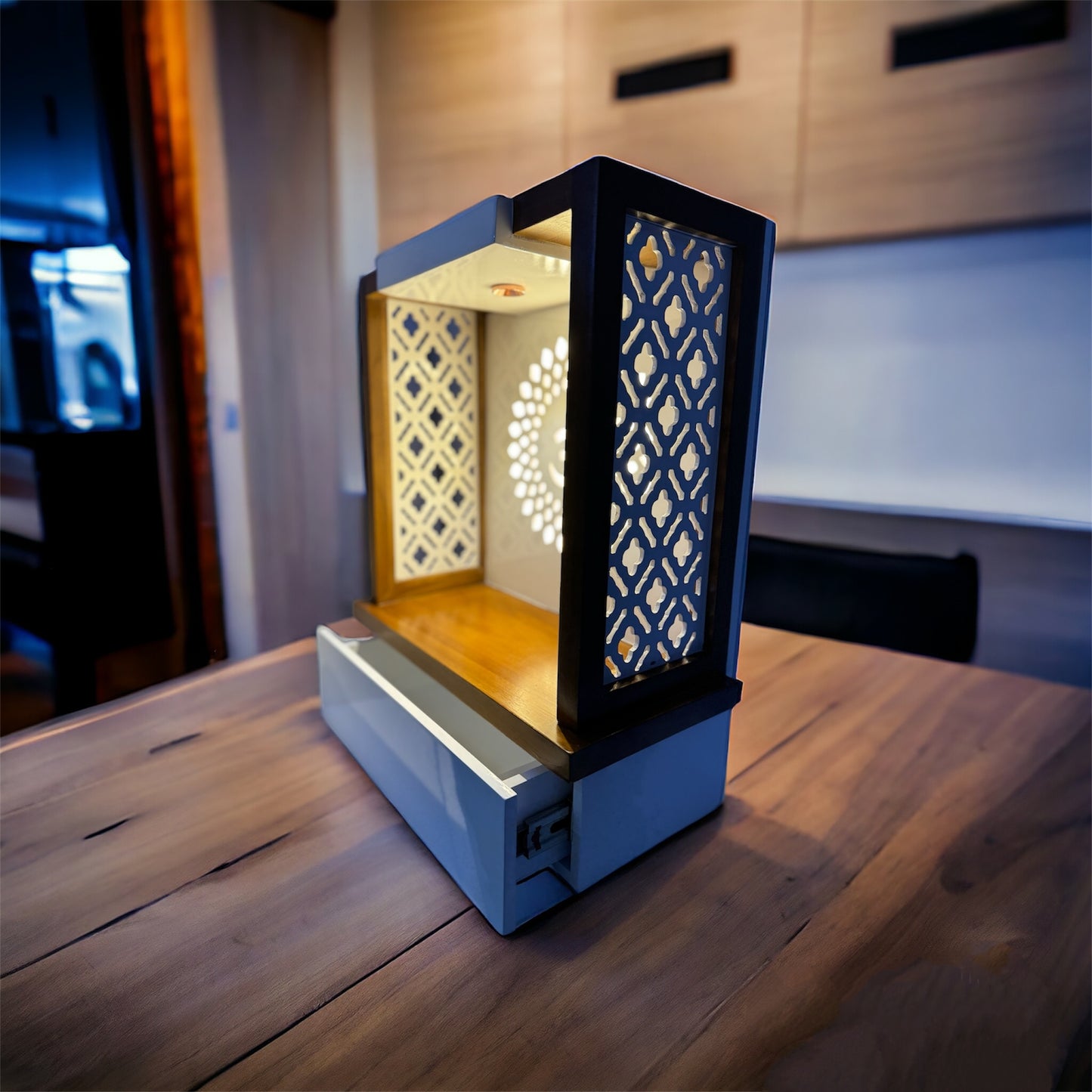 Elegant pooja mandir with rich wood finish, built-in drawer, and LED-lit Om backdrop to bring a touch of tradition and tranquility to any space.