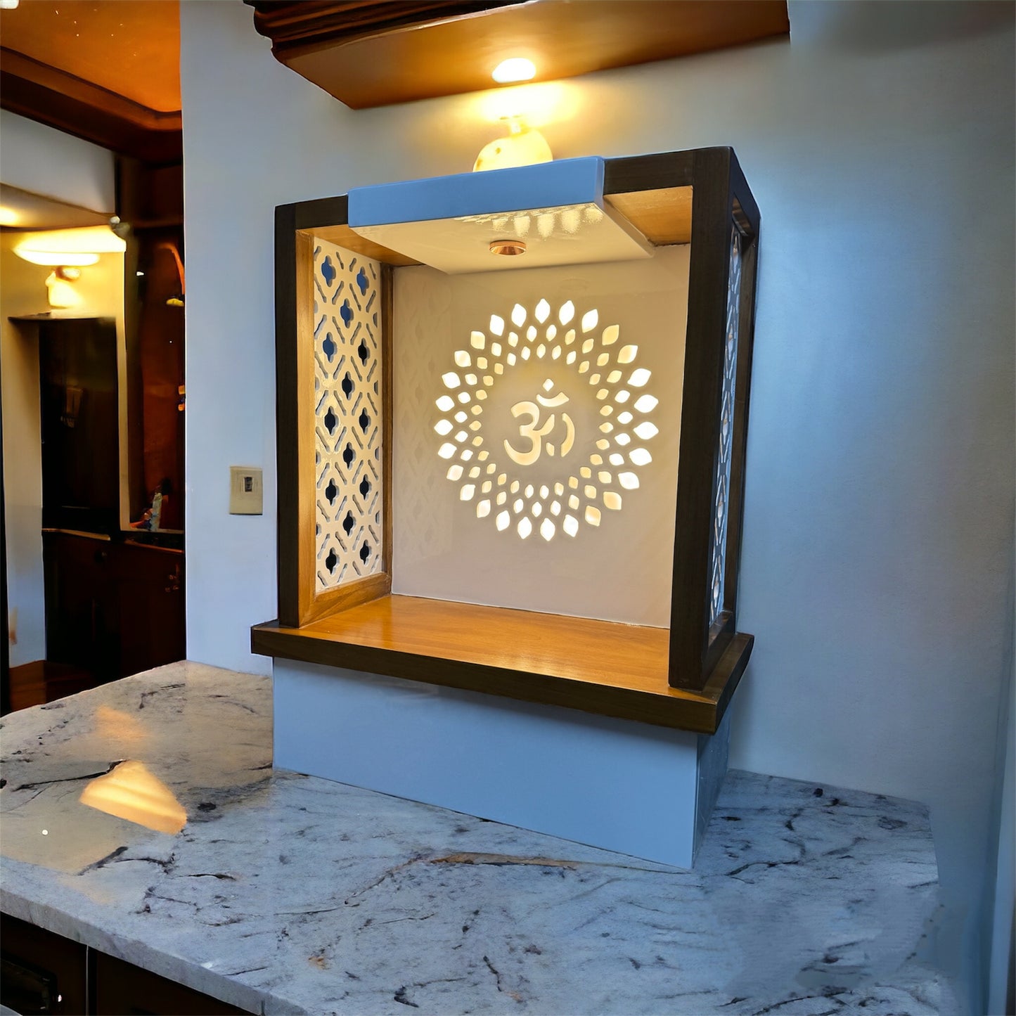 Contemporary home temple crafted in Teakwood with glowing Om motif and carved side panels, perfect for spiritual elegance in modern interiors.