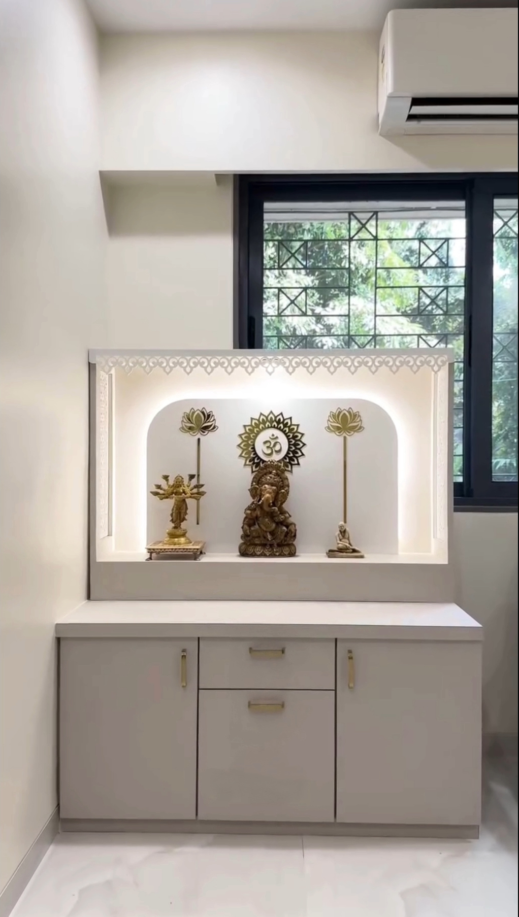 Contemporary home temple unit featuring CNC side panels, curved arch design, and illuminated backdrop with idols.