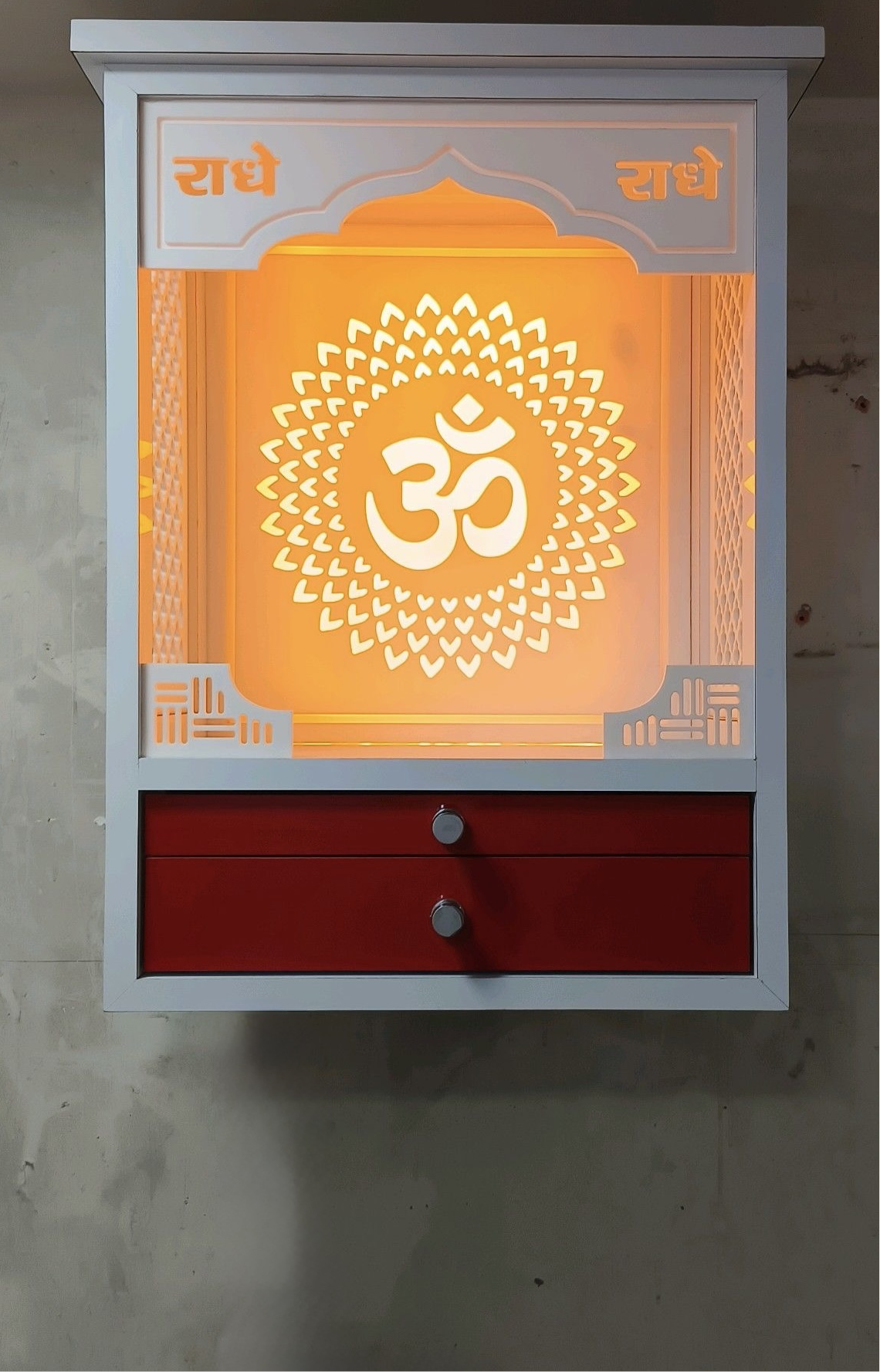 A sleek and modern prayer unit featuring high-quality Corian construction, an intricate Om cutout, and soft LED backlighting. Ideal for compact urban homes.
