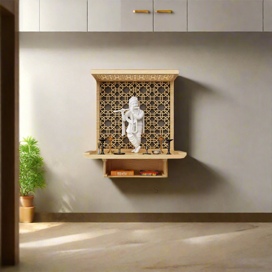 Modern wooden wall-mounted pooja mandir with white Krishna idol and intricate jaali back panel, ideal for contemporary Indian home interiors.