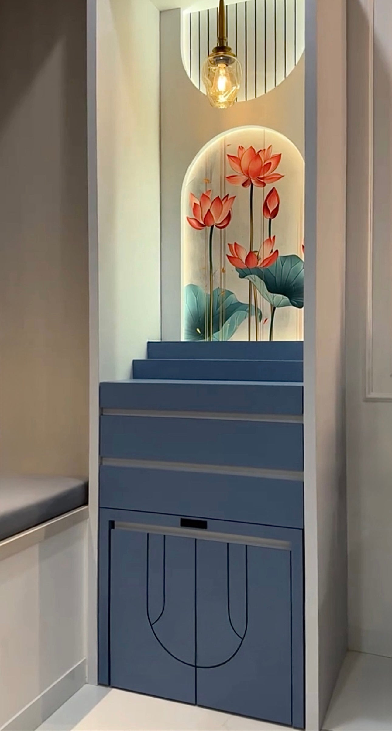 Designer home temple with storage and blue finish – contemporary pooja mandir with LED lights for apartments.