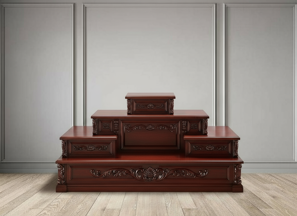 Front view of handcrafted teakwood mandir chowki with intricate carvings and polished finish for home temple décor.