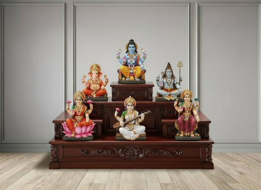 Beautiful teakwood mandir chowki decorated with Hindu deity idols for pooja room setup.