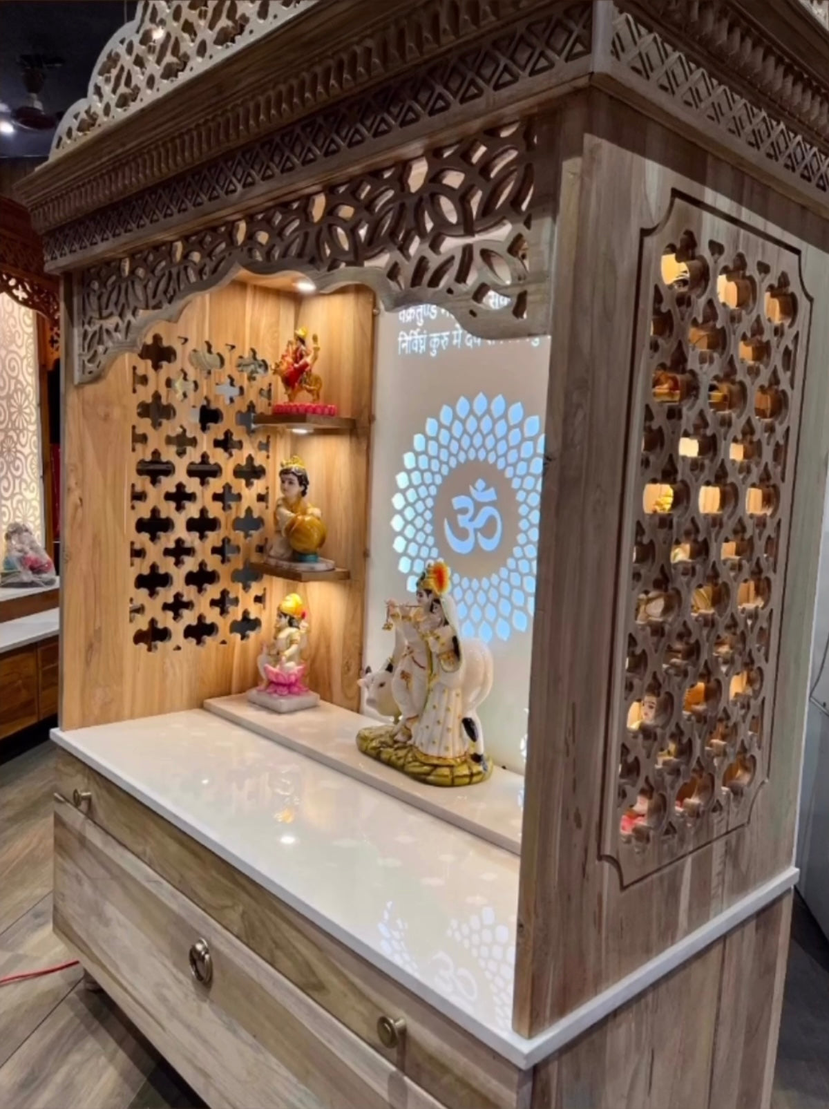 Premium wooden temple for home with LED OM panel, acrylic finish, and cabinet storage
