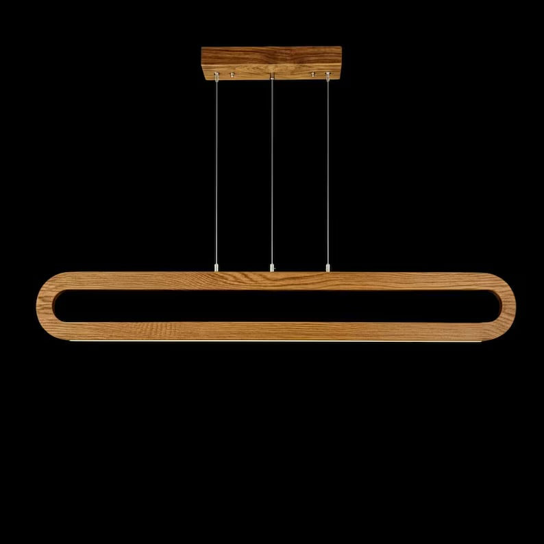 Wooden pendant light fixture on a black background