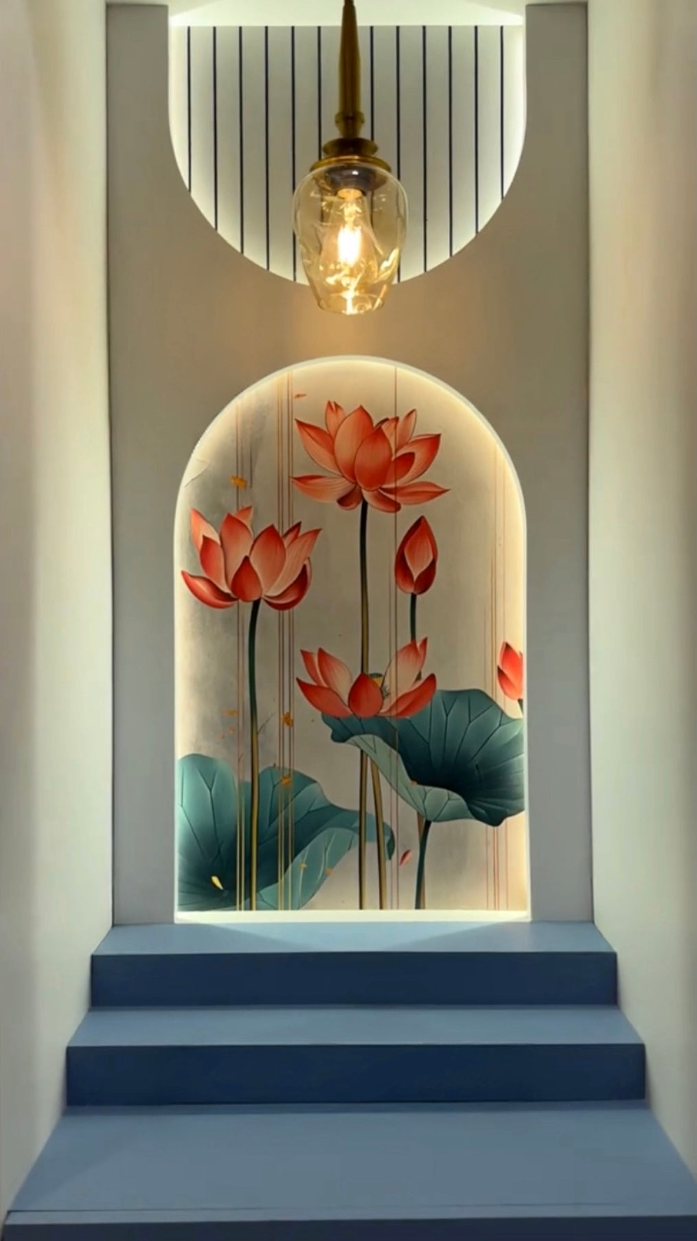 Contemporary home temple with lotus backdrop and step-style base – perfect pooja mandir for apartments.