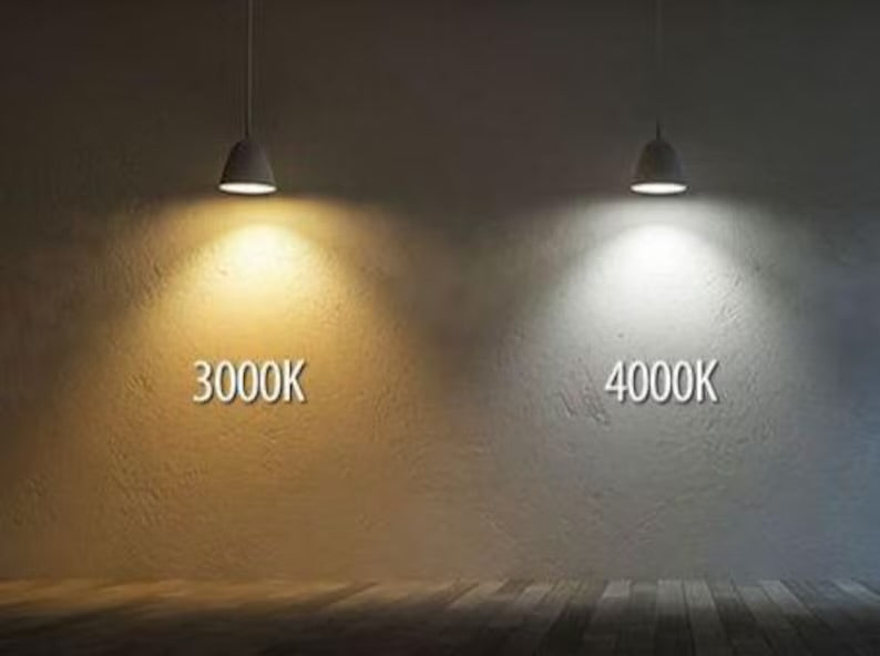 Two light bulbs casting different colored lights on a wall labeled 3000K and 4000K.