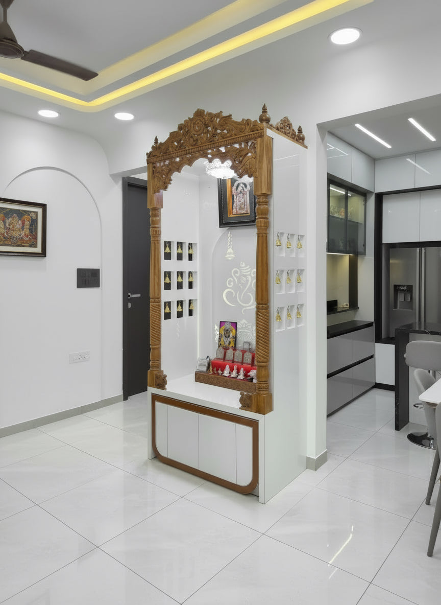Stylish pooja mandir with Ganesha wall motif, teakwood pillars, and illuminated backdrop for prayer room