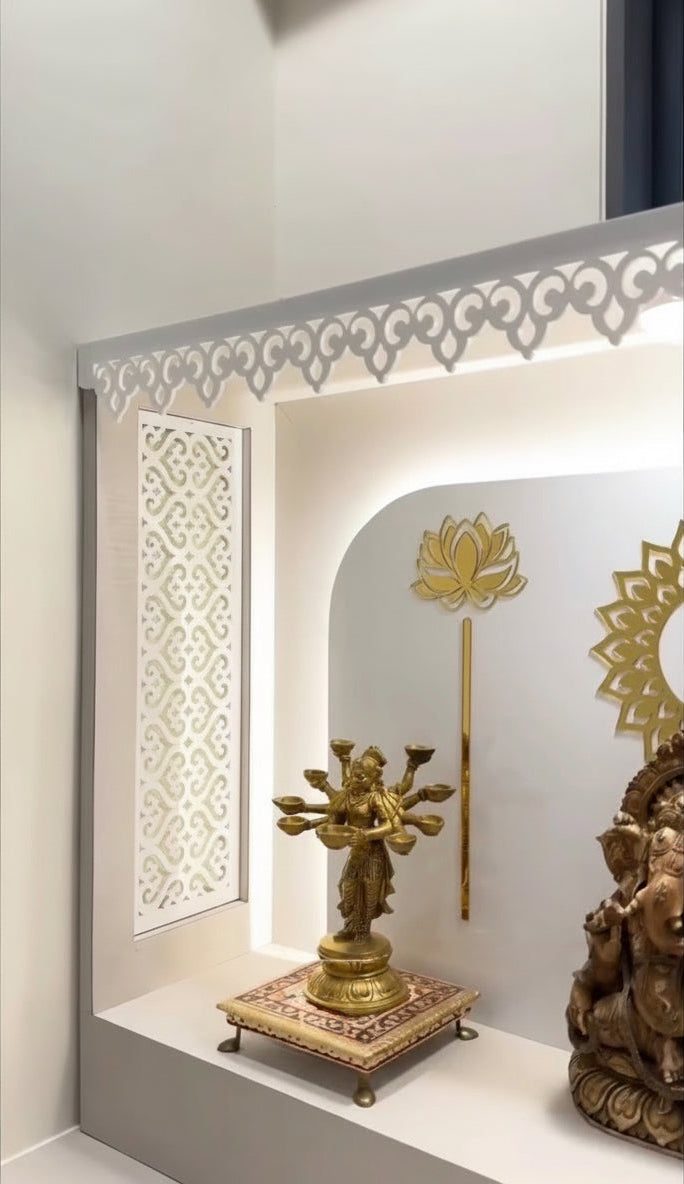 Elegant pooja mandir for home featuring LED cove lighting and minimalist design.