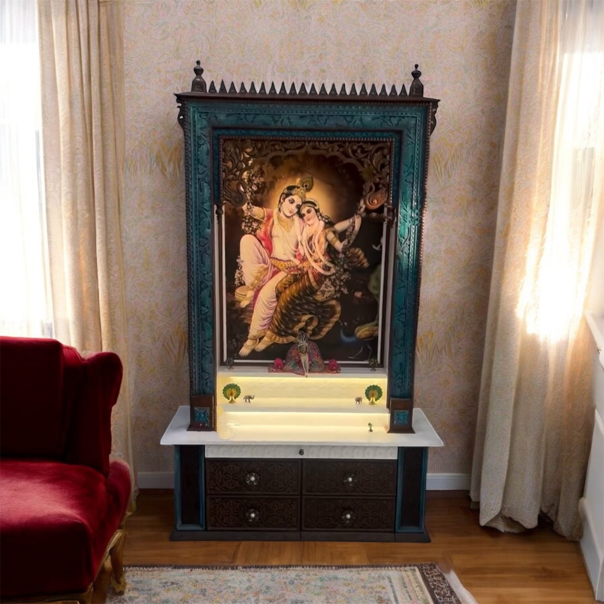 Large handcrafted wooden pooja mandir with a dark brown finish and peacock accents, featuring a Corian picture of Radhe Krishna and intricately carved drawer details.