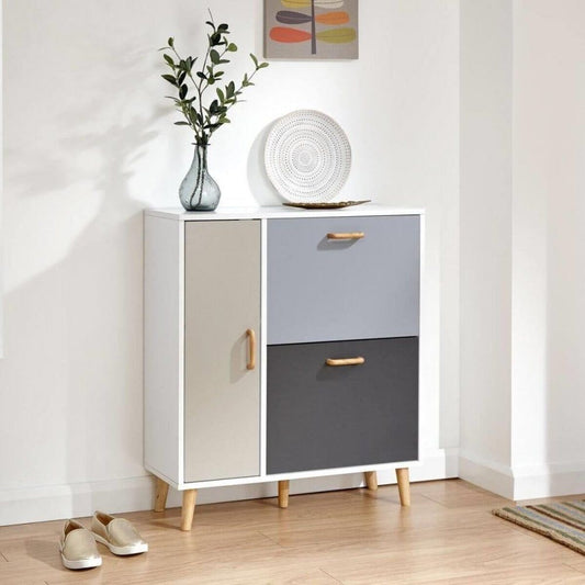 Modern multi-color shoe cabinet with wooden legs, placed in a bright hallway with minimalist decor.