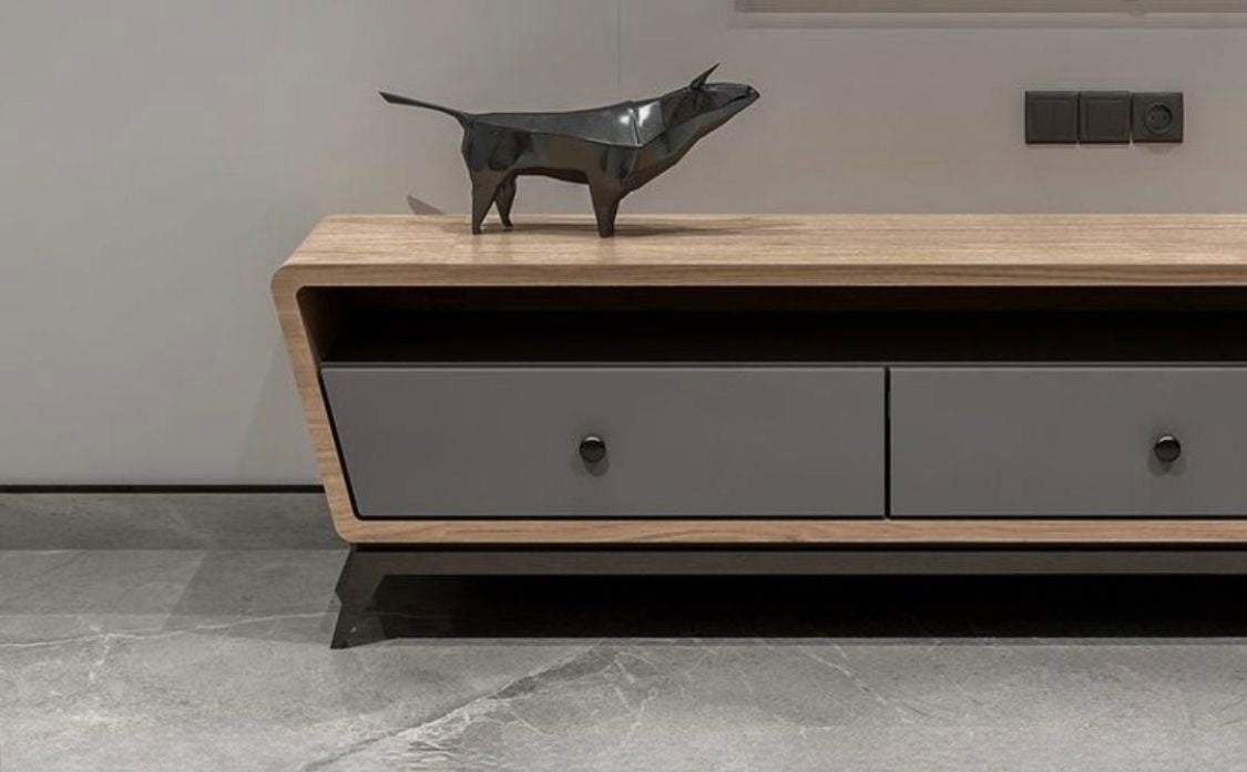 Minimalist wooden entertainment unit with sleek drawers and open shelf.