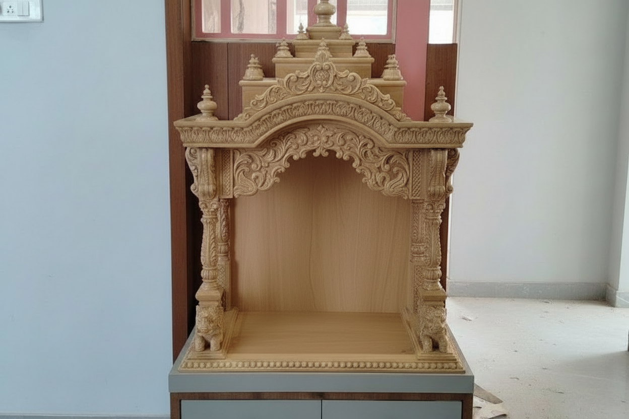 Handcrafted wooden pooja mandir with intricate carved temple design and storage drawers for home