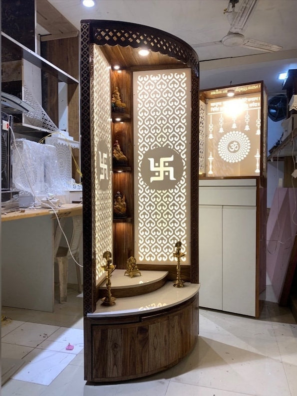 Elegant corner home temple with Swastik and Om symbol backlit panels, enhancing the spiritual aura with soft, ambient lighting.